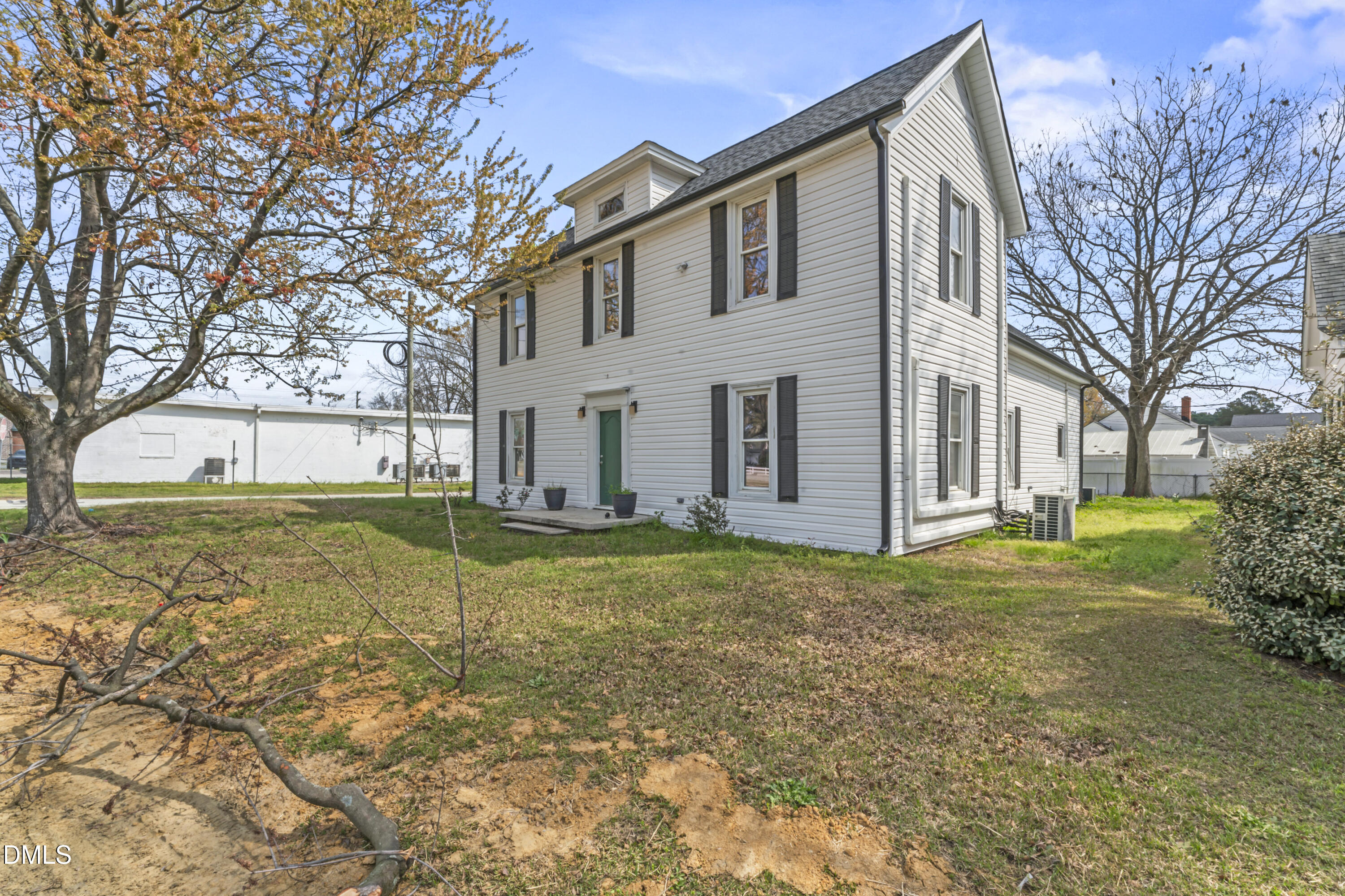 141 South Broad Street East Angier, NC 27501 - Photo 1 of 43 a view of a house with a yard