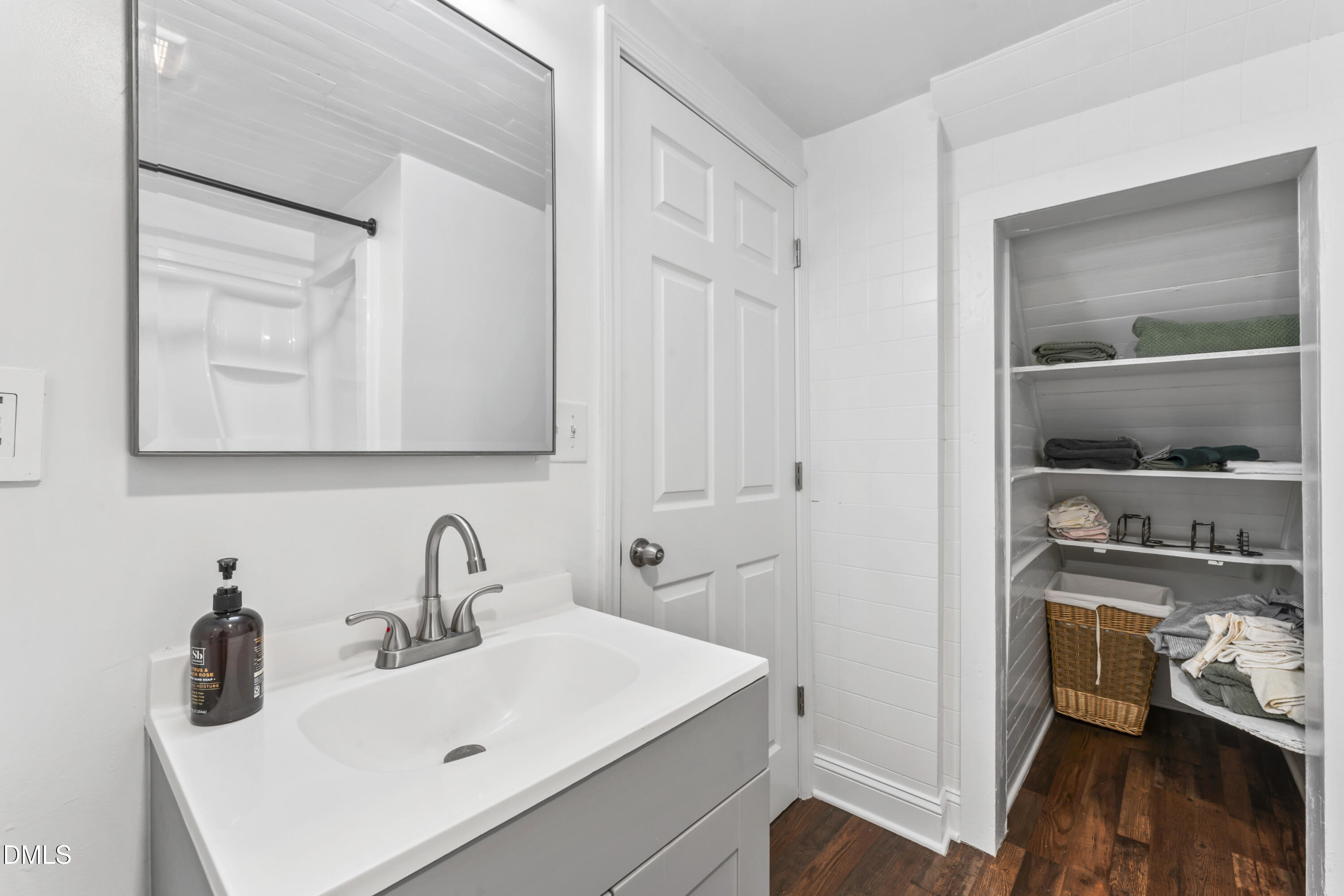 141 South Broad Street East Angier, NC 27501 - Photo 18 of 43 a bathroom with a sink and a mirror