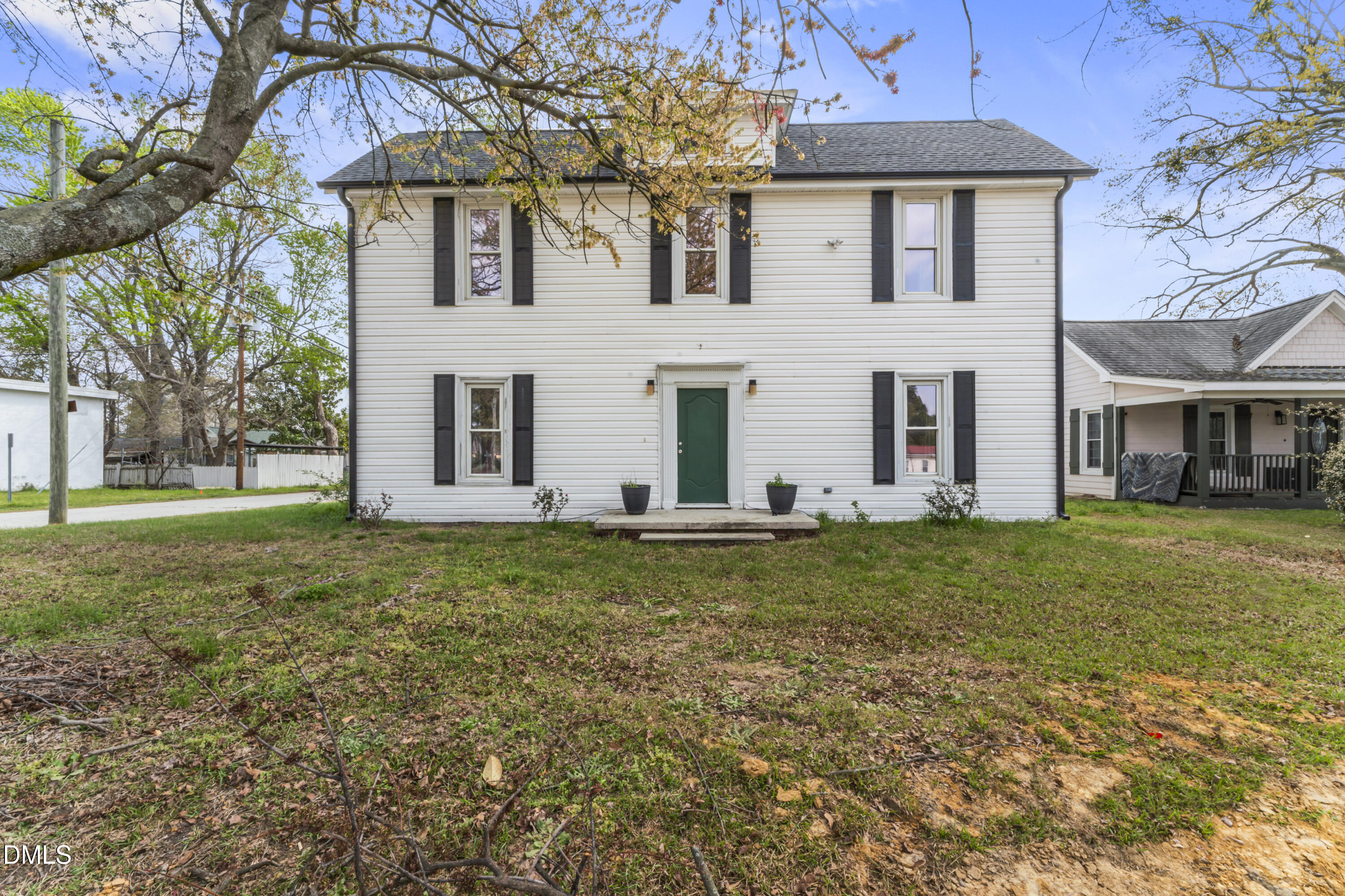 141 South Broad Street East Angier, NC 27501 - Photo 2 of 43 a view of a house with a backyard