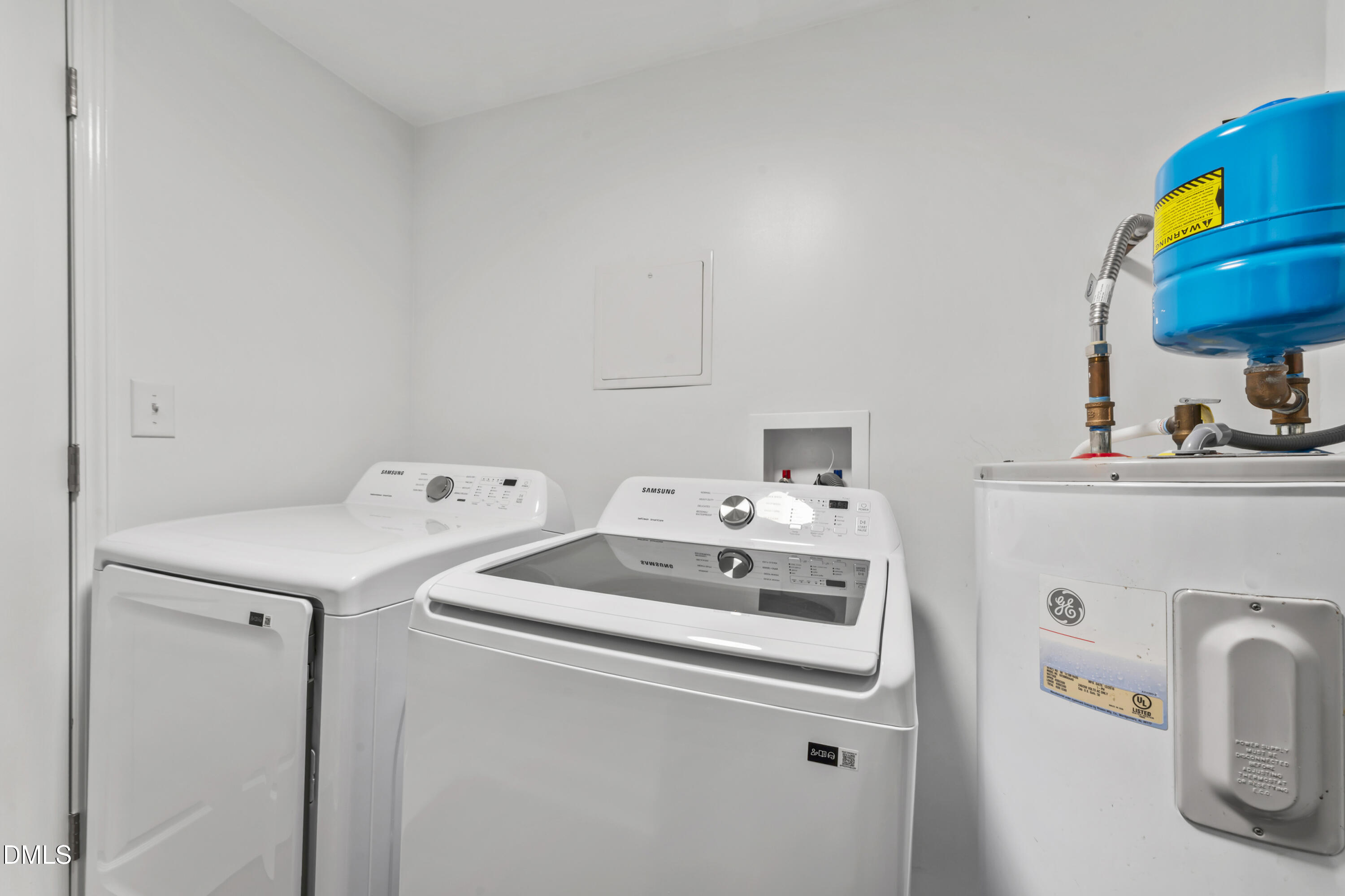 141 South Broad Street East Angier, NC 27501 - Photo 21 of 43 a utility room with dryer and washer
