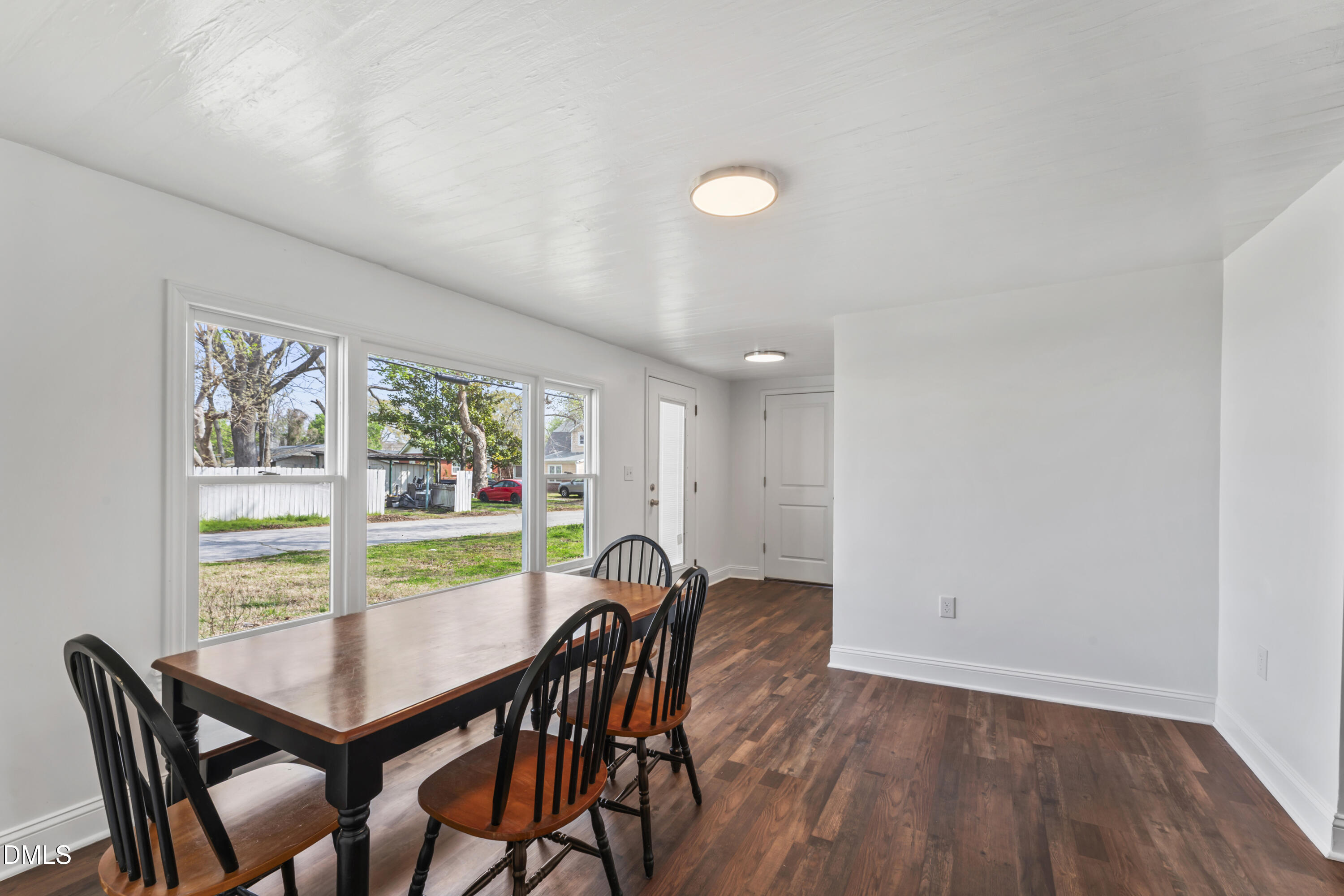 141 South Broad Street East Angier, NC 27501 - Photo 22 of 43 a view of a dining room with furniture and window