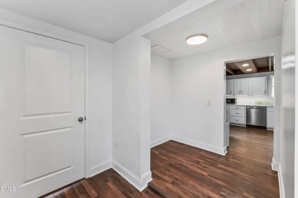 a view of kitchen and wooden floor
