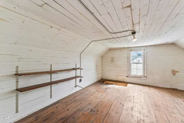 a view of a room with racks on the wall