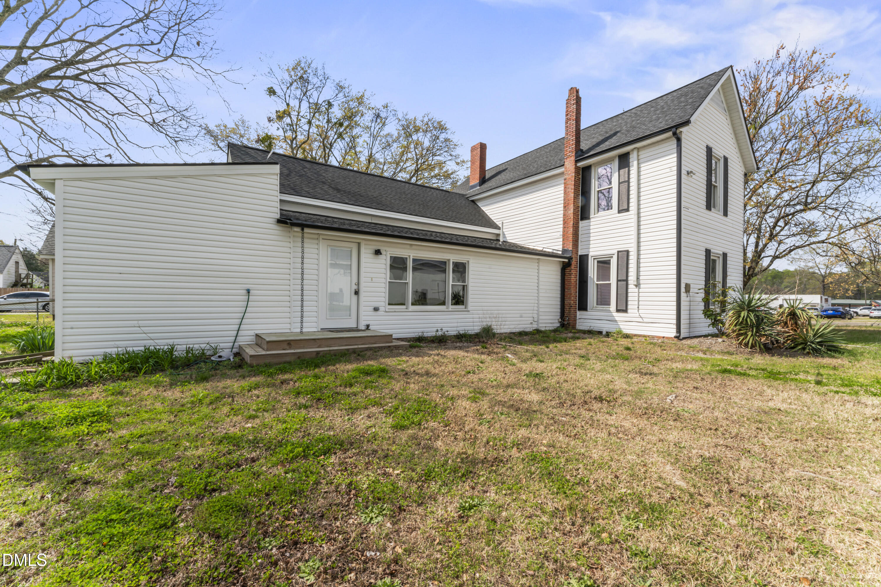 141 South Broad Street East Angier, NC 27501 - Photo 5 of 43 a view of a house with a yard