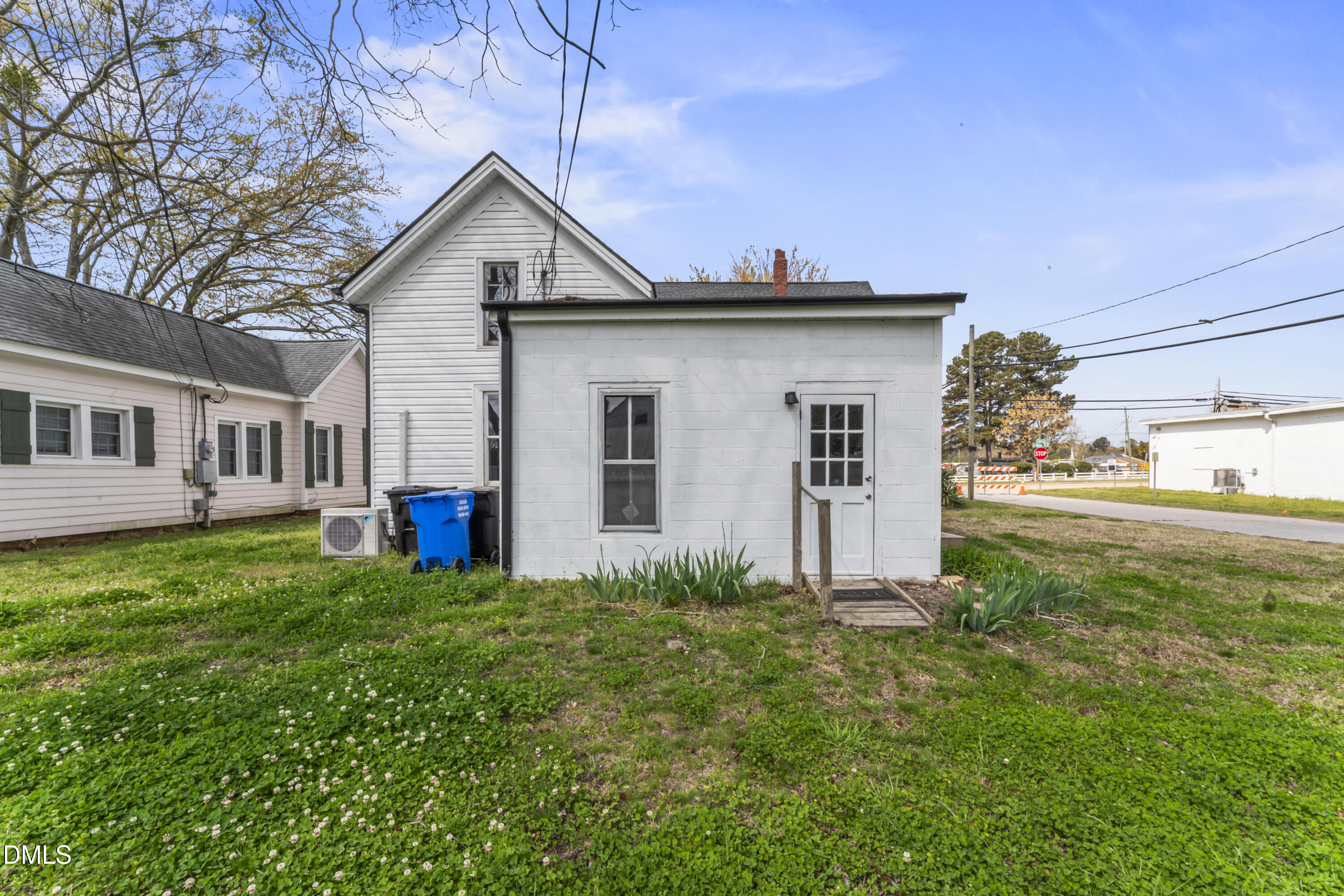 141 South Broad Street East Angier, NC 27501 - Photo 6 of 43 a view of a house with backyard