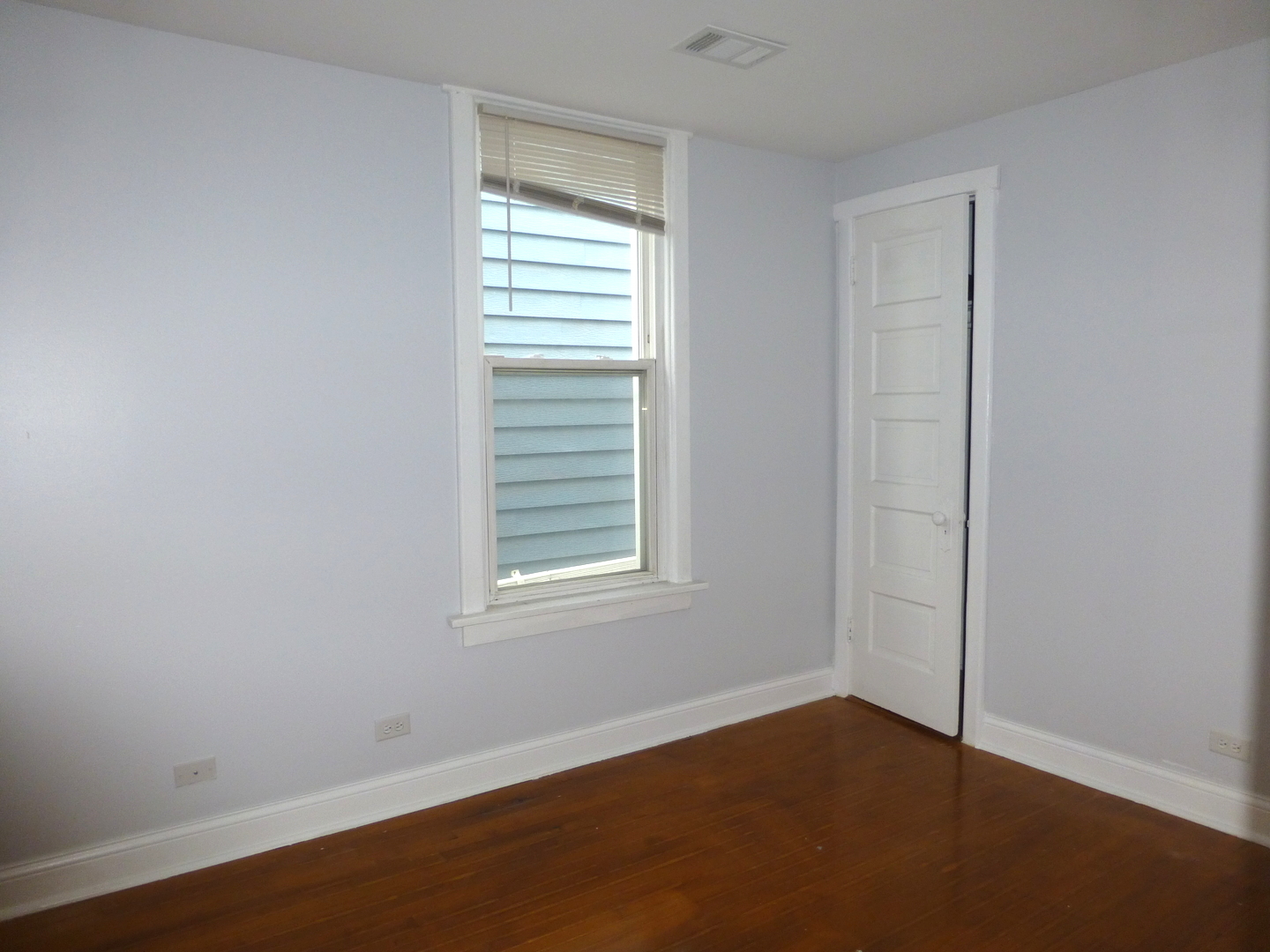 Undisclosed Address Chicago, IL 60647 - Photo 6 of 14 an empty room with a window