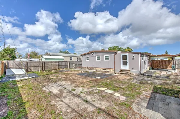 a view of a barn with a yard