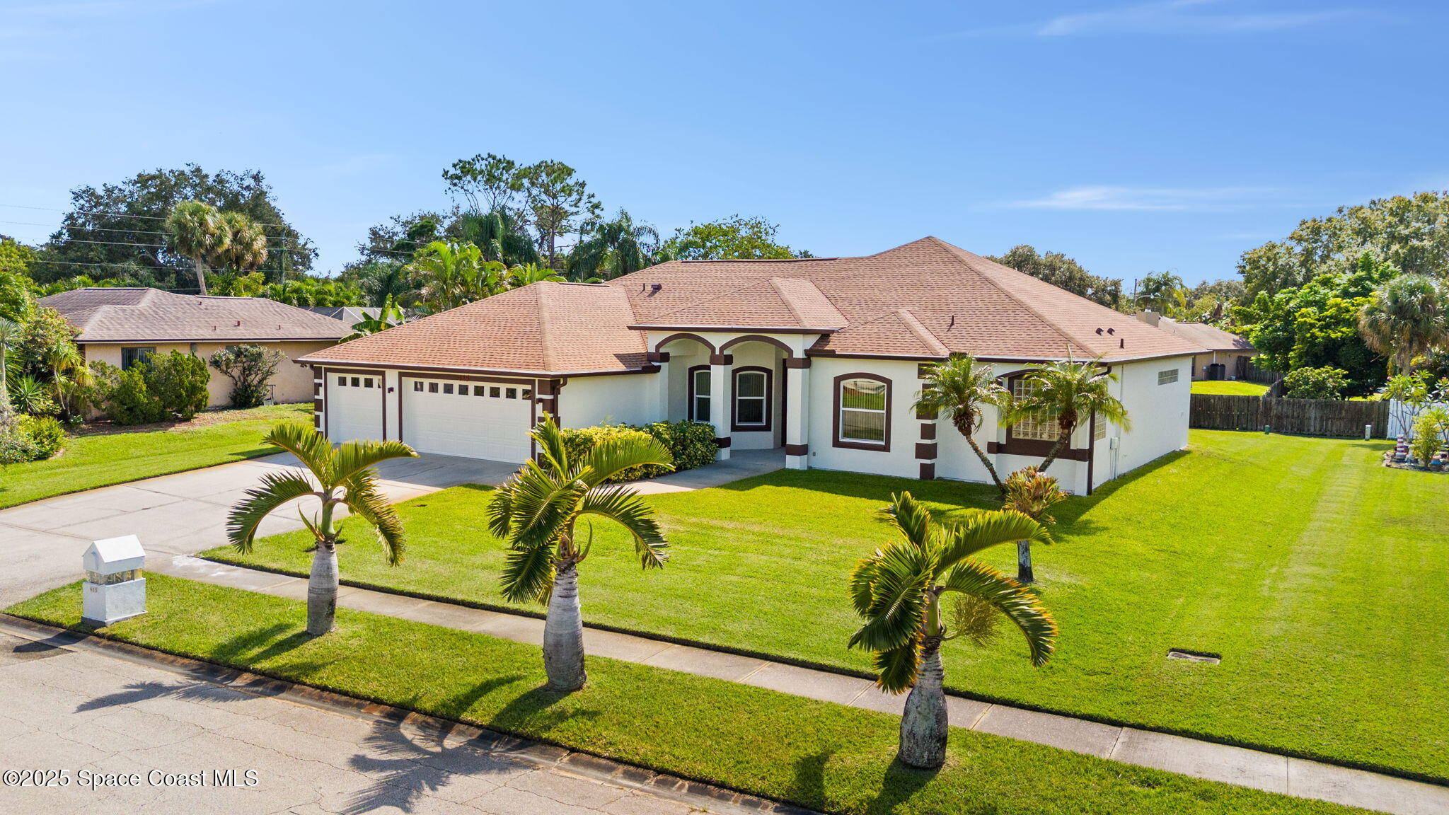 a view of a swimming pool with a lounge chairs