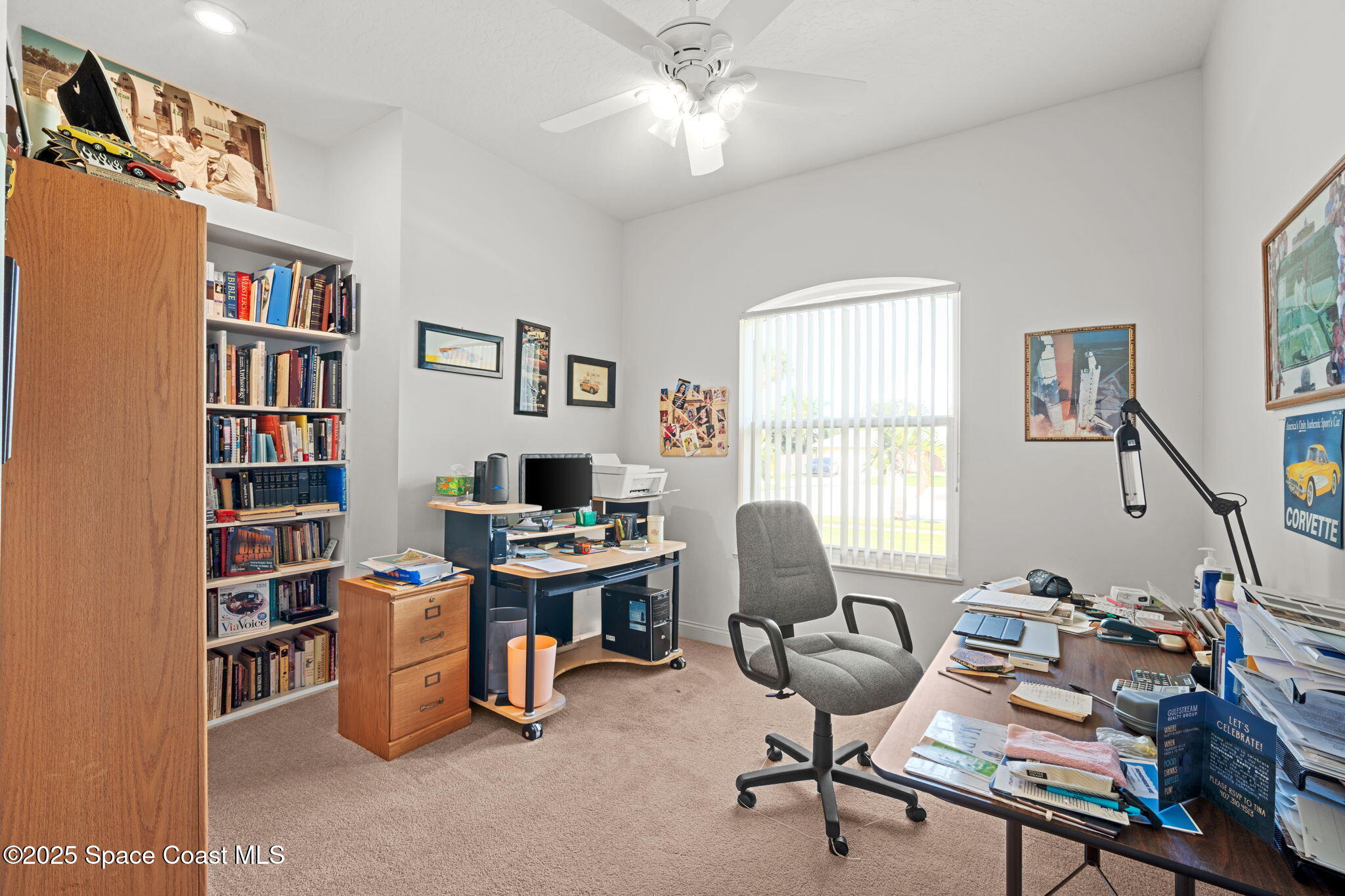 415 Indian Bay Boulevard Merritt Island, FL 32953 - Photo 23 of 37 a view of a workspace with a window and cabinet