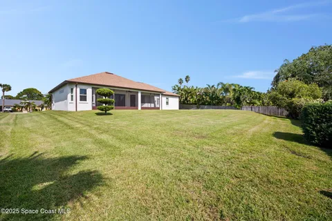 a view of storage and utility room with washer and dryer