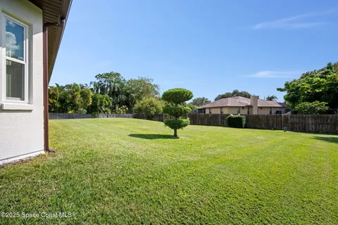a house view with a garden space
