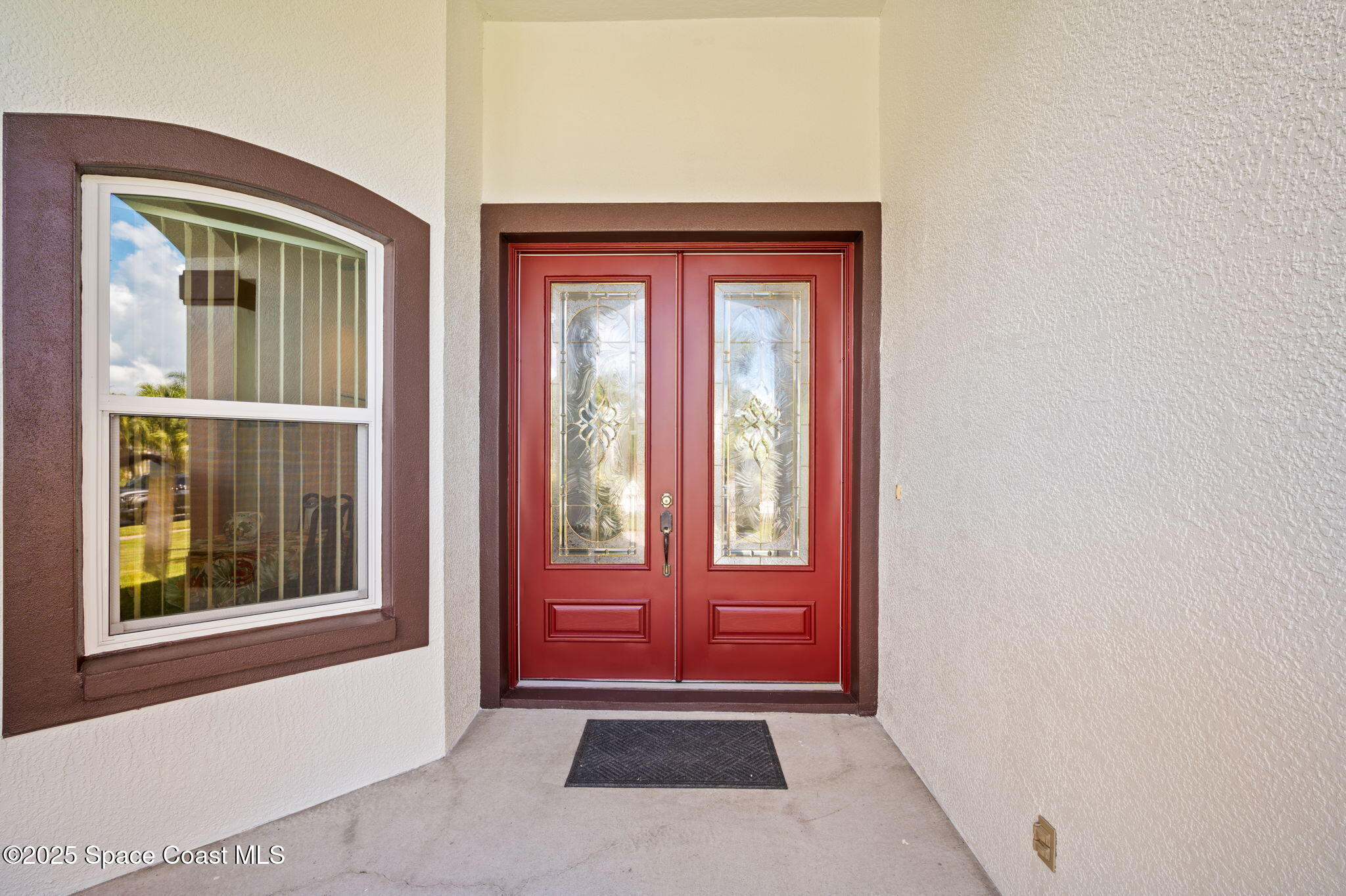 415 Indian Bay Boulevard Merritt Island, FL 32953 - Photo 4 of 37 a view of front door