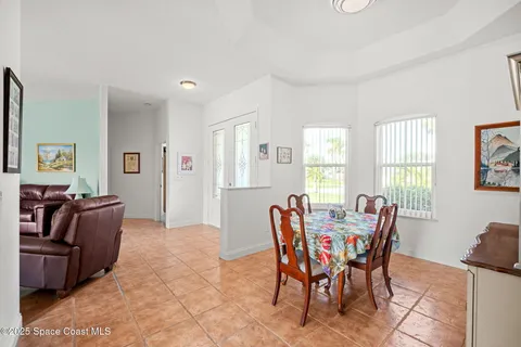 a view of a livingroom with furniture and window