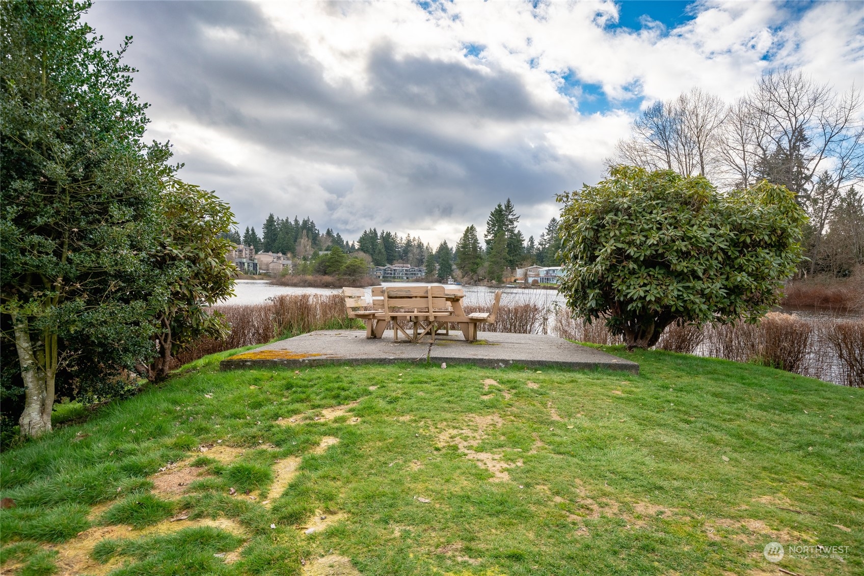 820 Cady Road, Unit C203 Everett, WA 98203 - Photo 11 of 19 a view of a garden with an outdoor seating