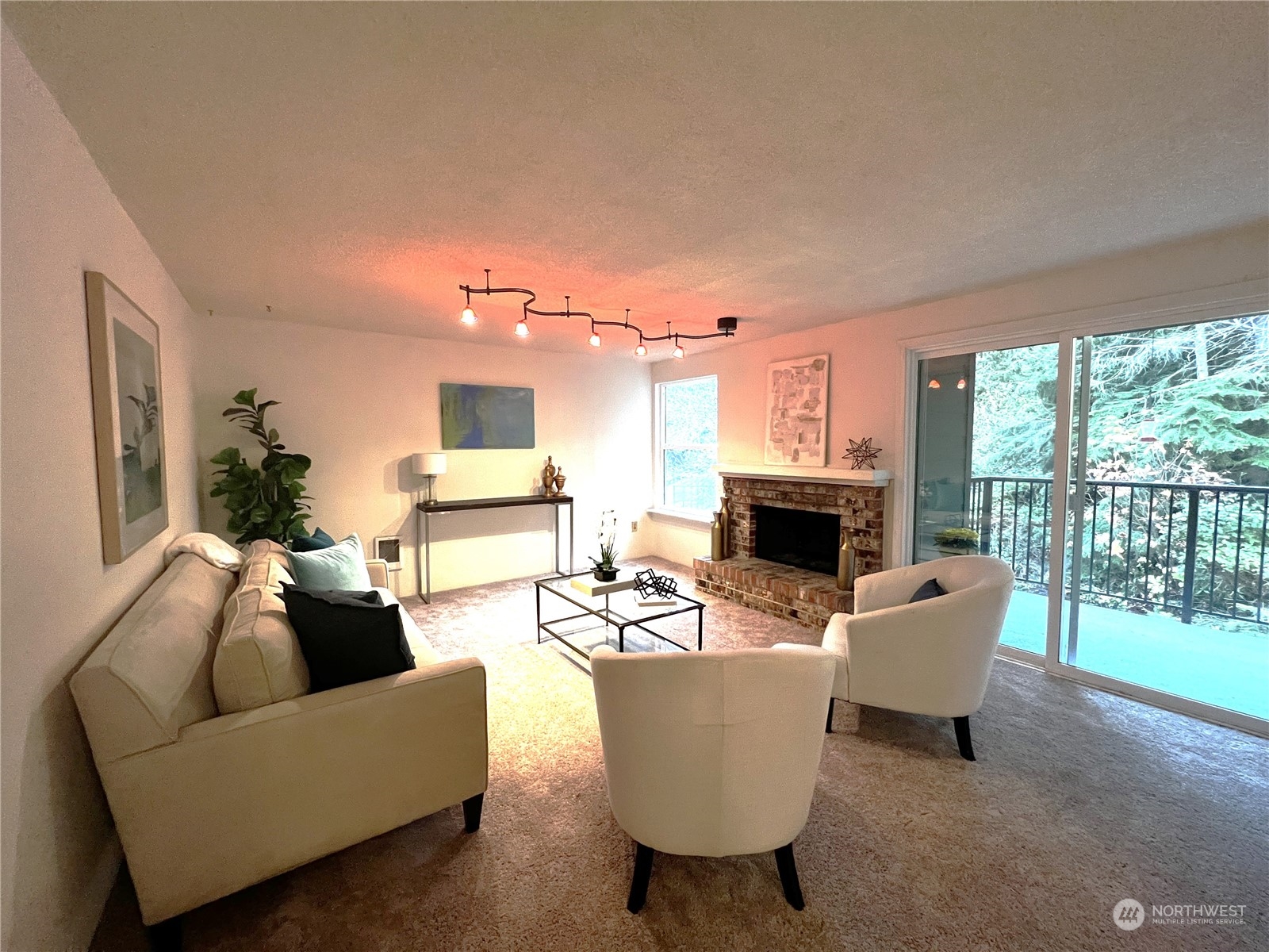 820 Cady Road, Unit C203 Everett, WA 98203 - Photo 15 of 19 a living room with fireplace furniture and a large window