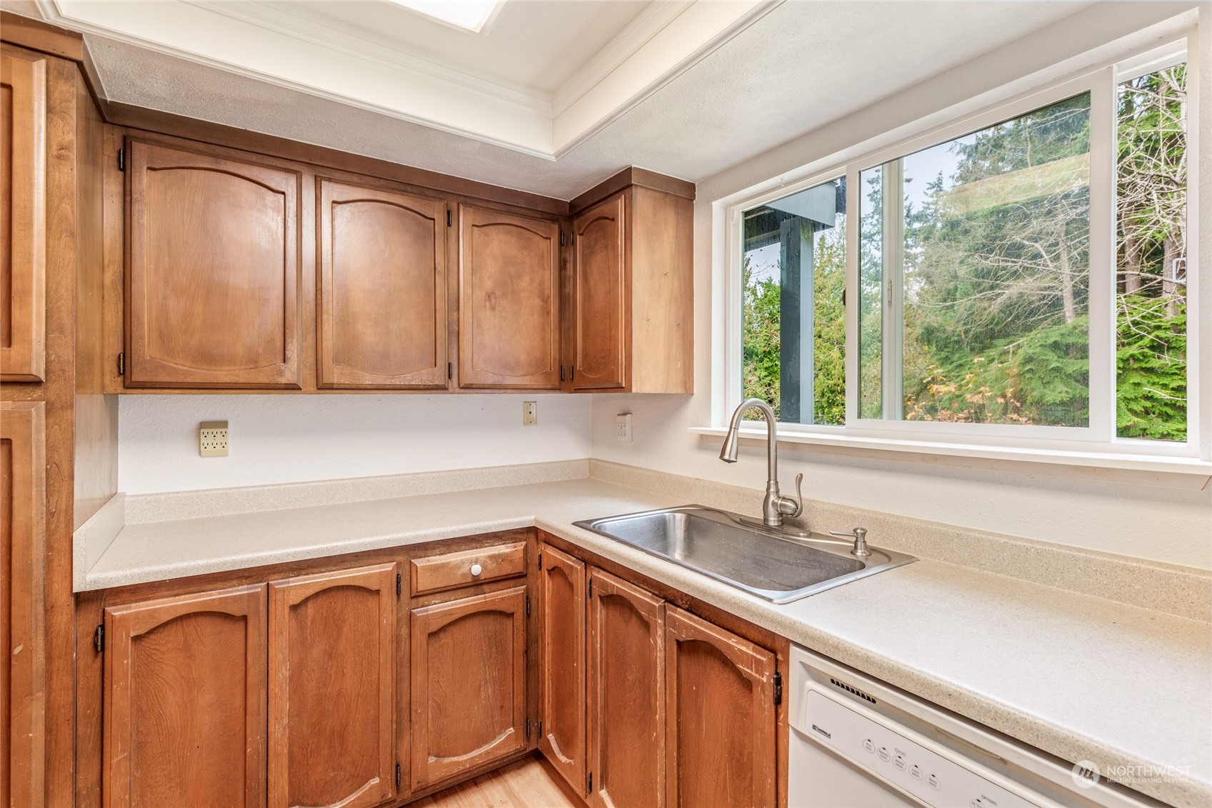 820 Cady Road, Unit C203 Everett, WA 98203 - Photo 3 of 19 a kitchen with stainless steel appliances granite countertop a sink a refrigerator and cabinets