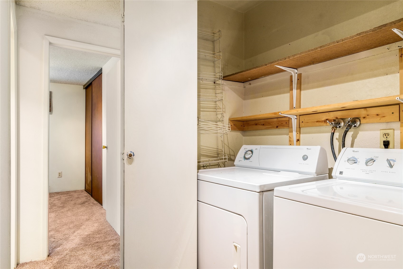 820 Cady Road, Unit C203 Everett, WA 98203 - Photo 5 of 19 a view of storage and utility room with washer and dryer