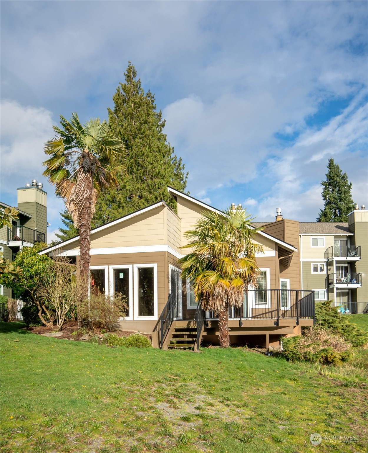 820 Cady Road, Unit C203 Everett, WA 98203 - Photo 8 of 19 a view of a house with a yard and sitting area
