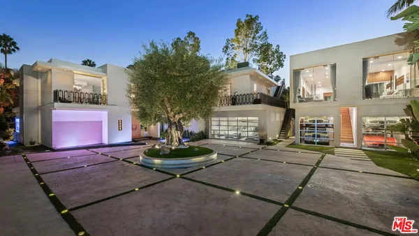 a view of a swimming pool with lounge chair