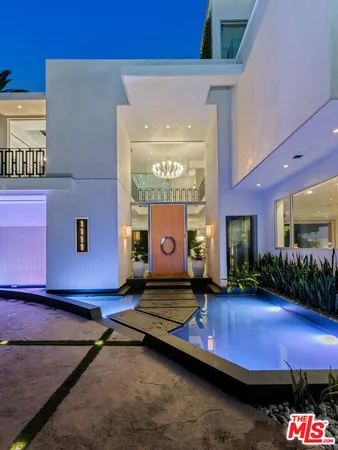 a room with furniture and a chandelier