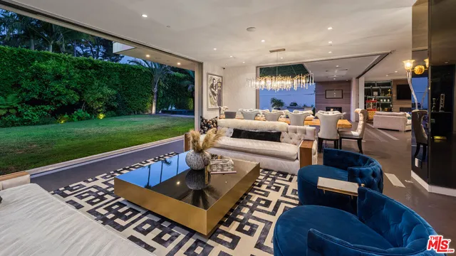 a bathroom with two mirror and a bathtub