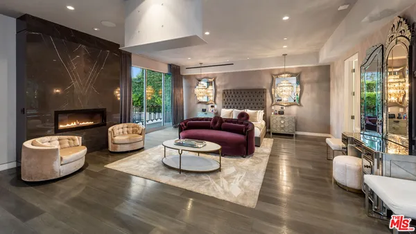 a kitchen with stainless steel appliances a sink stove and cabinets