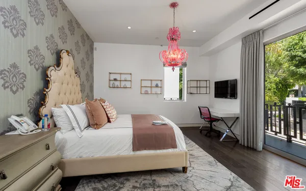 a view of a building with a swimming pool