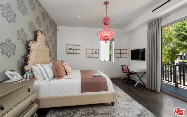 a view of a building with a swimming pool