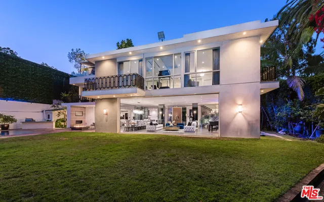 a view of a park with large trees