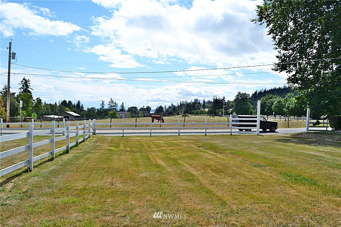 5791 Double Bluff Road Freeland, WA 98249 - Photo 23 of 25 a view of a swimming pool with an outdoor seating