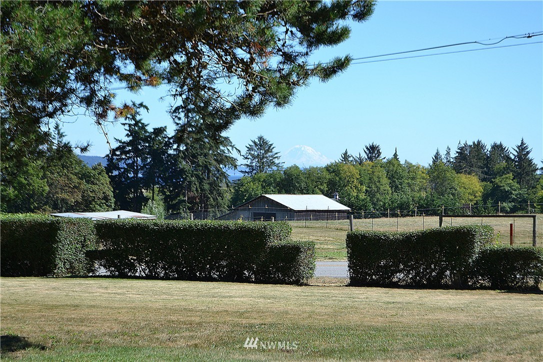 5791 Double Bluff Road Freeland, WA 98249 - Photo 24 of 25 a front view of a house with a yard