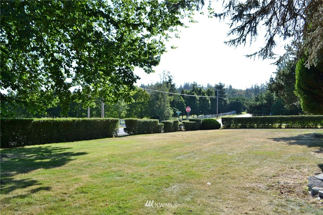 5791 Double Bluff Road Freeland, WA 98249 - Photo 25 of 25 a swimming pool with wooden fence