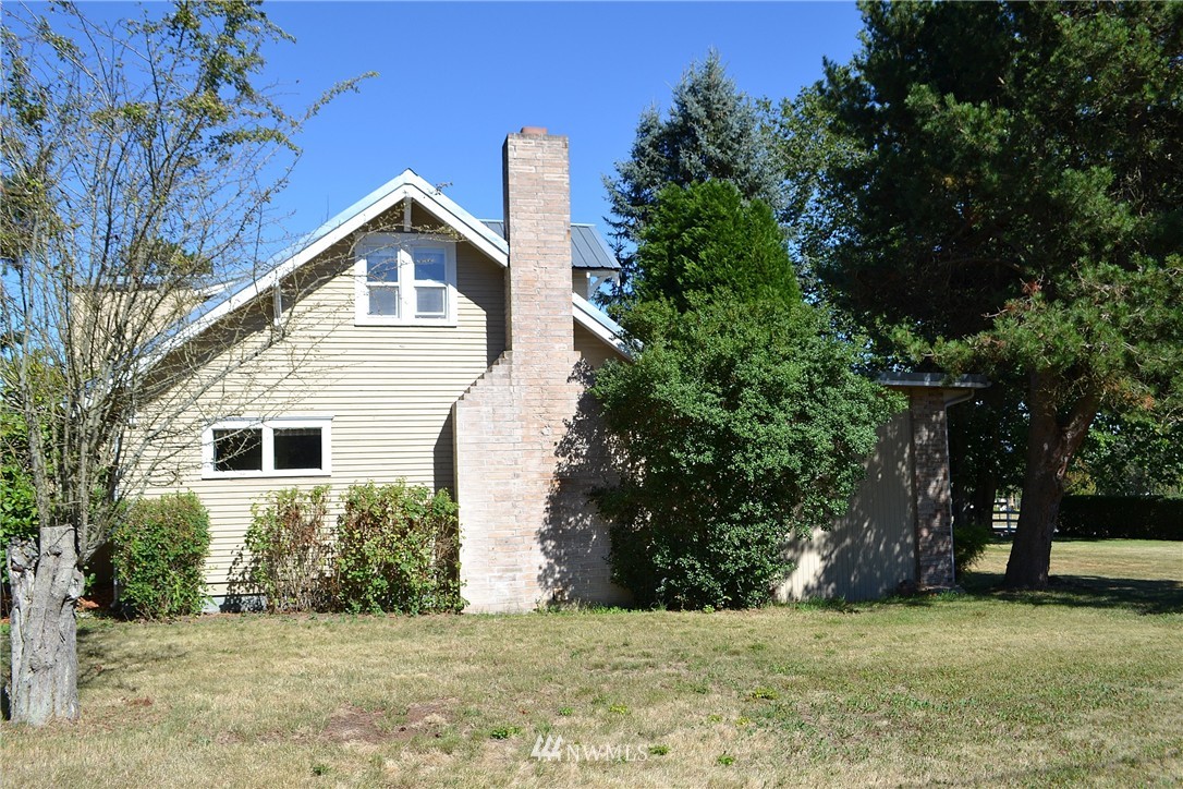 5791 Double Bluff Road Freeland, WA 98249 - Photo 5 of 25 a view of a house with a yard