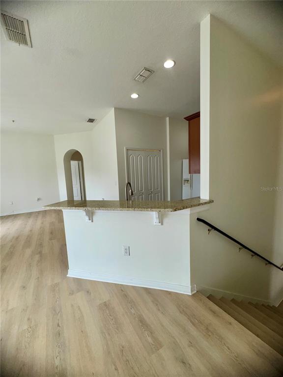 6404 South Goldenrod Road, Unit 2A Orlando, FL 32822 - Photo 14 of 40 a view of a kitchen with a sink