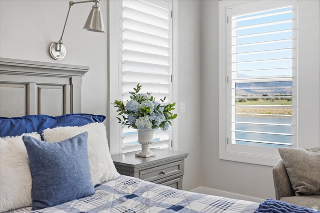 21 Pier Place Tooele, UT 84074 - Photo 78 of 112 Window with white plantation shutters, offering a water and mountain landscape