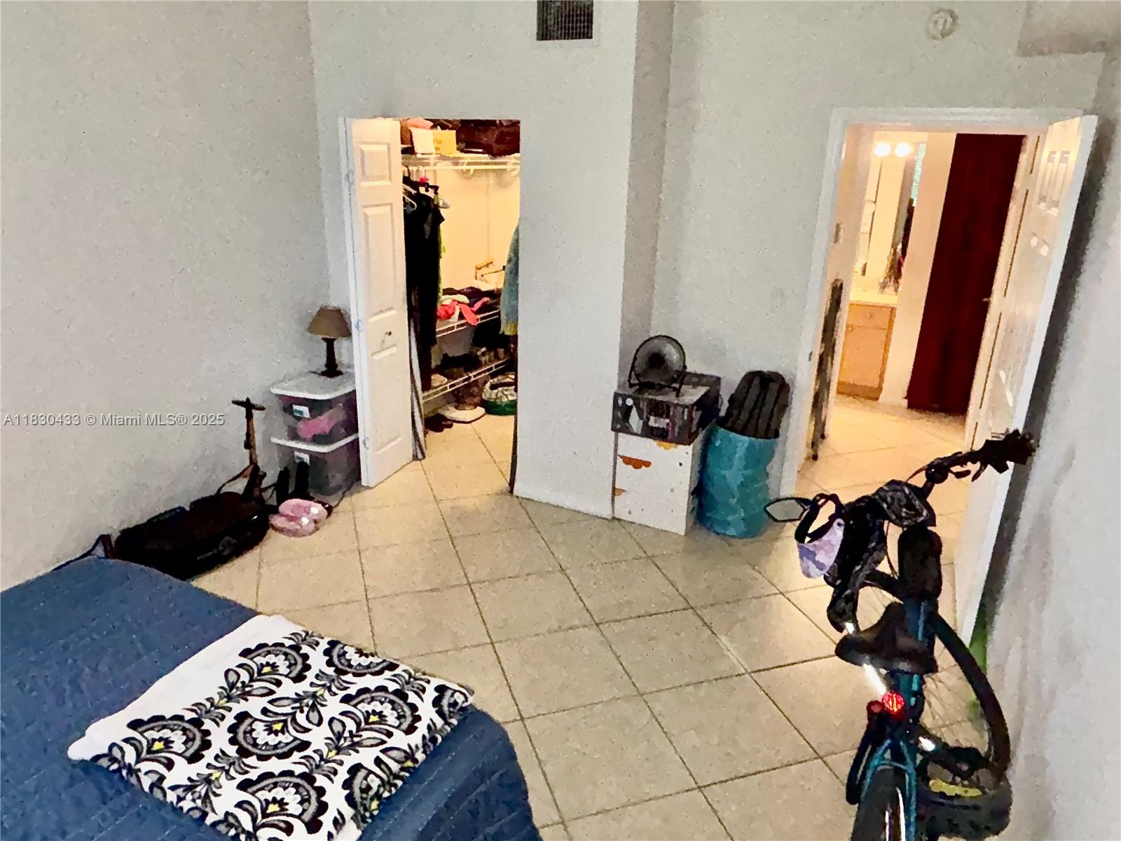 2630 Southwest 28th Street, Unit 34 Miami, FL 33133 - Photo 18 of 26 a view of an entryway with workspace