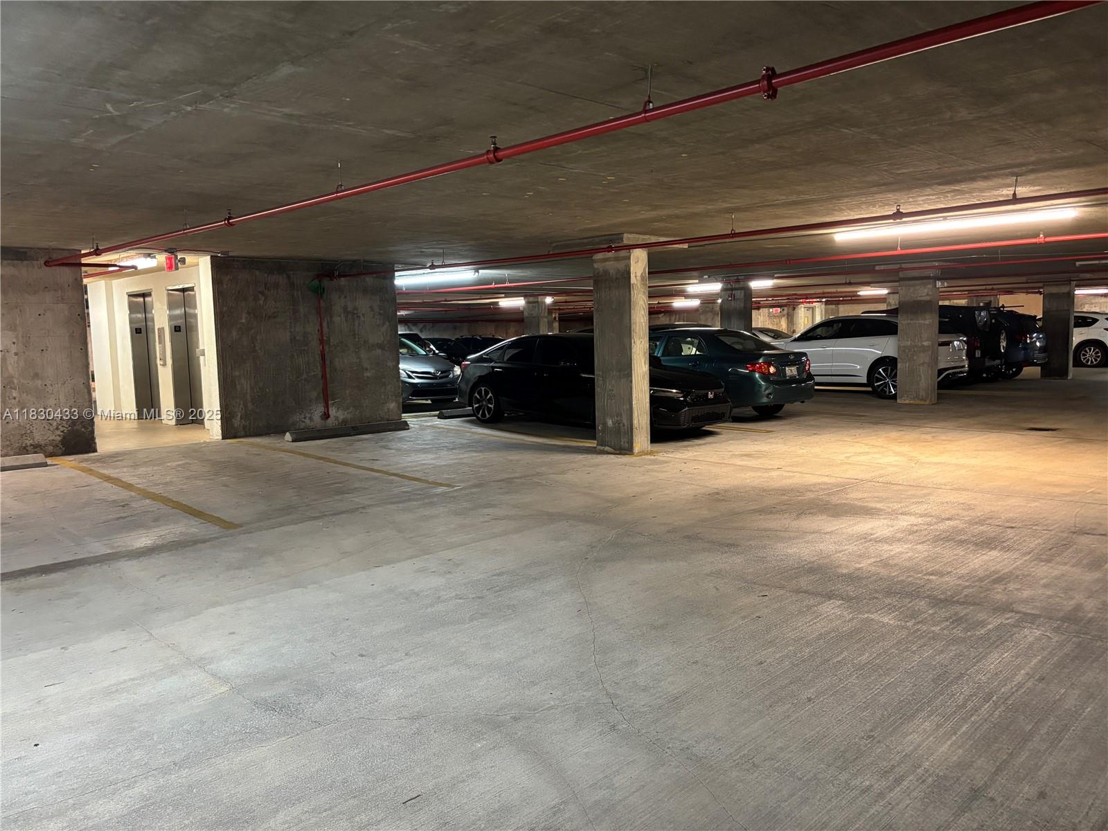 2630 Southwest 28th Street, Unit 34 Miami, FL 33133 - Photo 23 of 26 a view of parking area