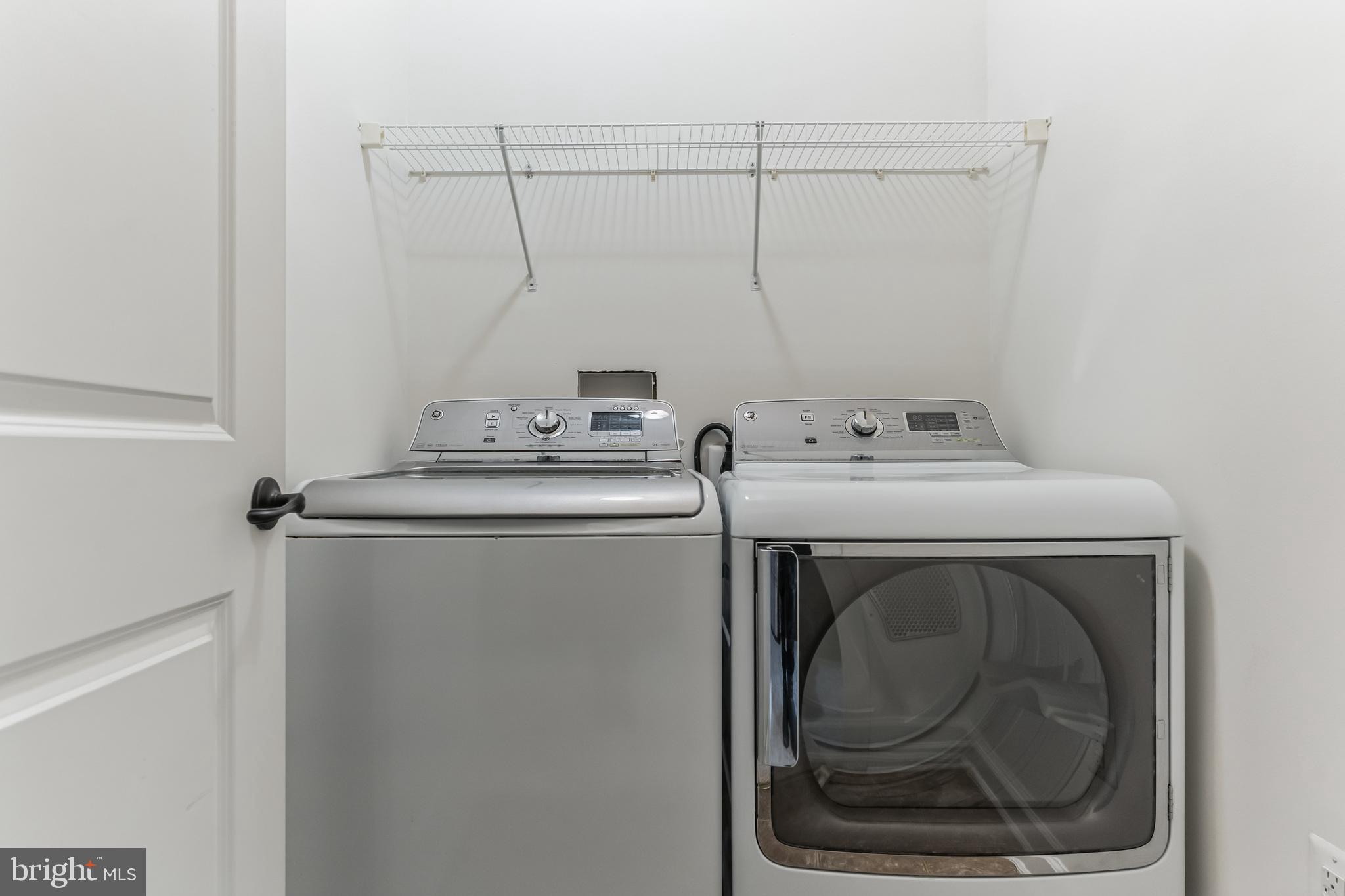 4927 Collingtons Bounty Drive Bowie, MD 20720 - Photo 27 of 38 a utility room with dryer and washer