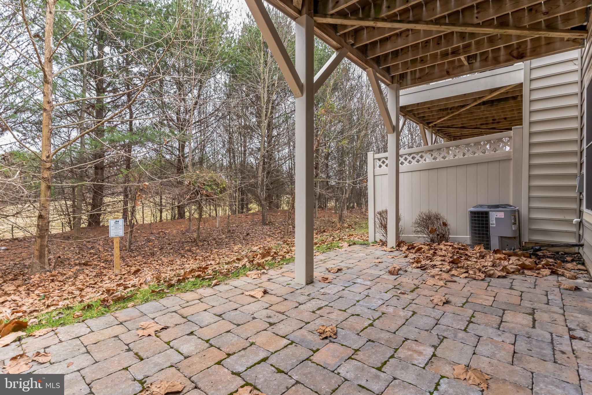 4927 Collingtons Bounty Drive Bowie, MD 20720 - Photo 37 of 38 a outdoor view of a house with trees