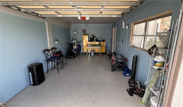 a view of a lake with houses in the back