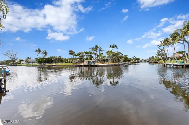 a view of a lake with a house