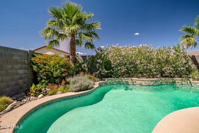 a view of a garden with a fountain