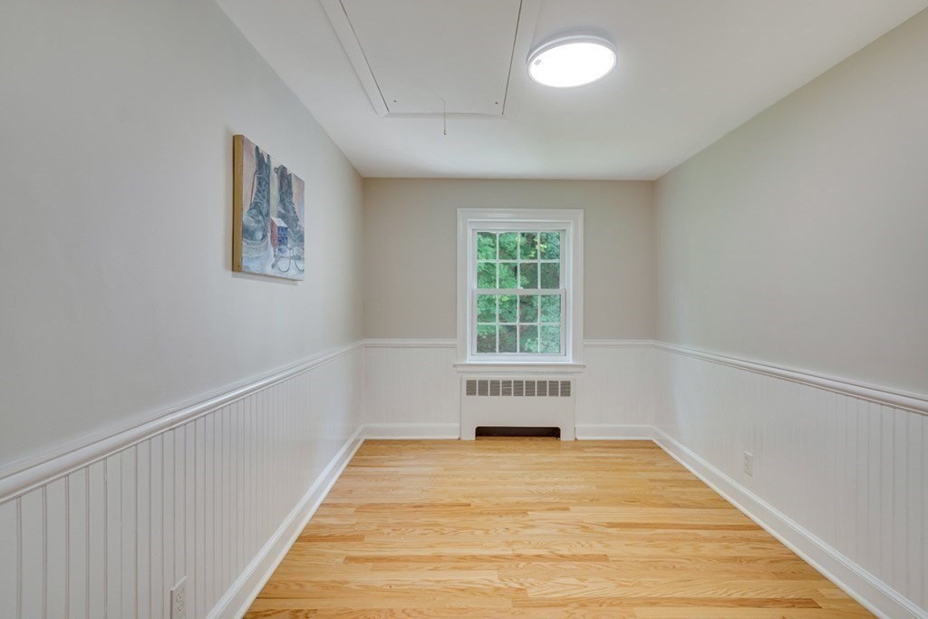 65 Longfellow Road Newton, MA 02462 - Photo 23 of 38 a view of an empty room with a window