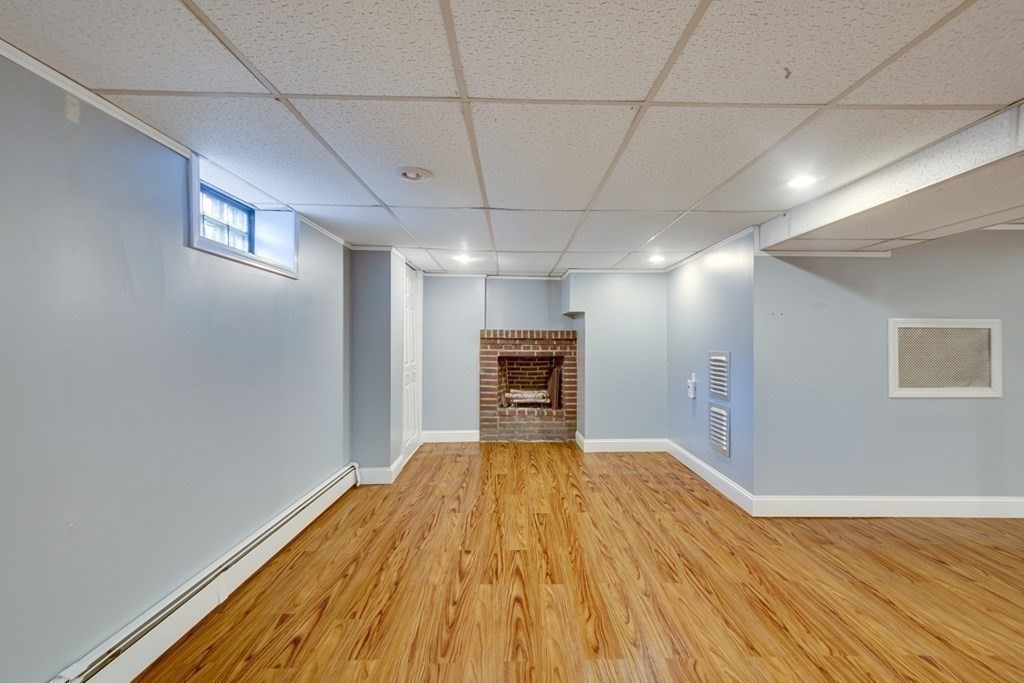 65 Longfellow Road Newton, MA 02462 - Photo 24 of 38 a view of a livingroom with wooden floor