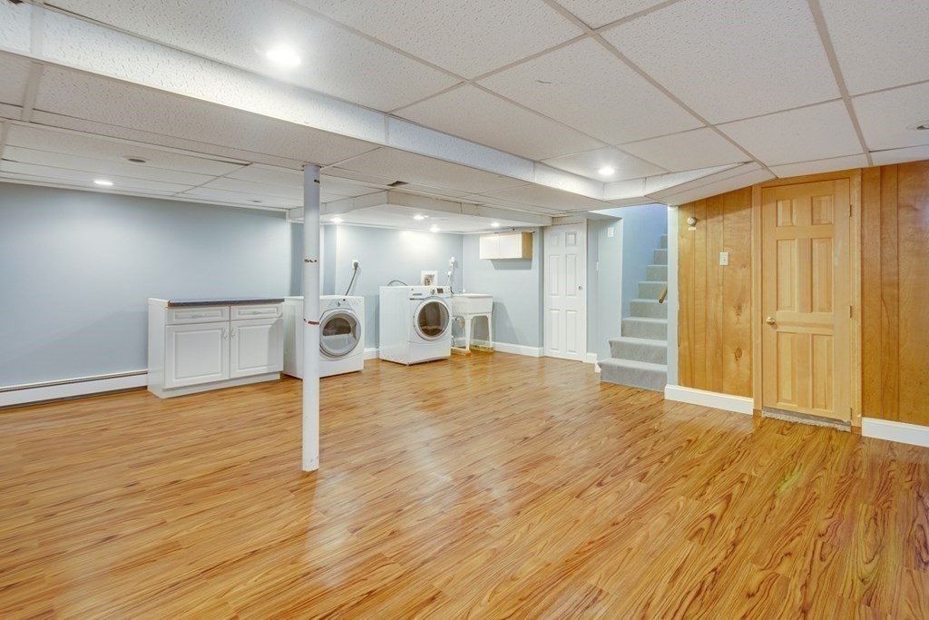 65 Longfellow Road Newton, MA 02462 - Photo 26 of 38 a view of an empty room with wooden floor