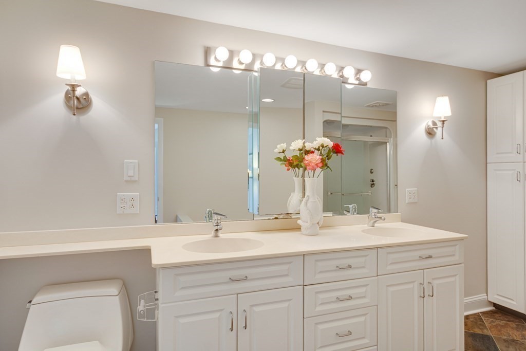 65 Longfellow Road Newton, MA 02462 - Photo 4 of 38 a bathroom with a sink vanity and a mirror
