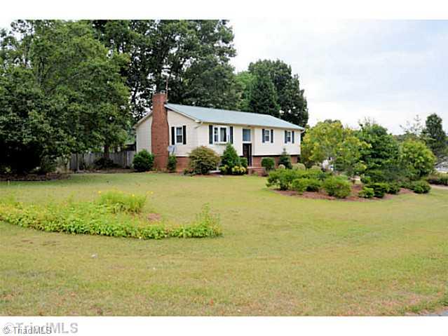 Exterior Front. Large flat corner lot!