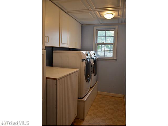 Laundry Room. Lots of Cabinets in this Laundry Room