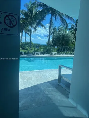 a view of a yard with a bench