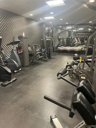 a view of a room with gym equipment